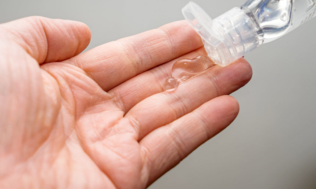 Hand sanitiser being applied to a hand.