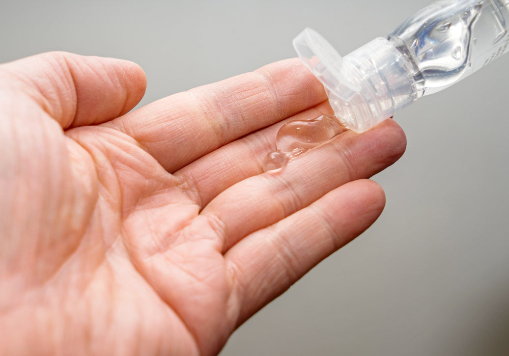 Hand sanitiser being applied to a hand.