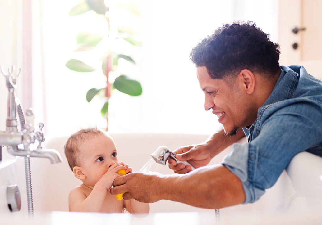 A baby being bathed