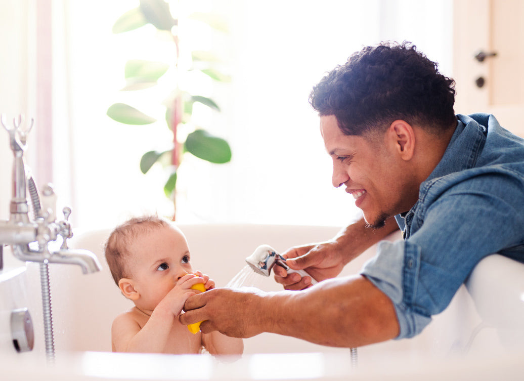 A baby being bathed