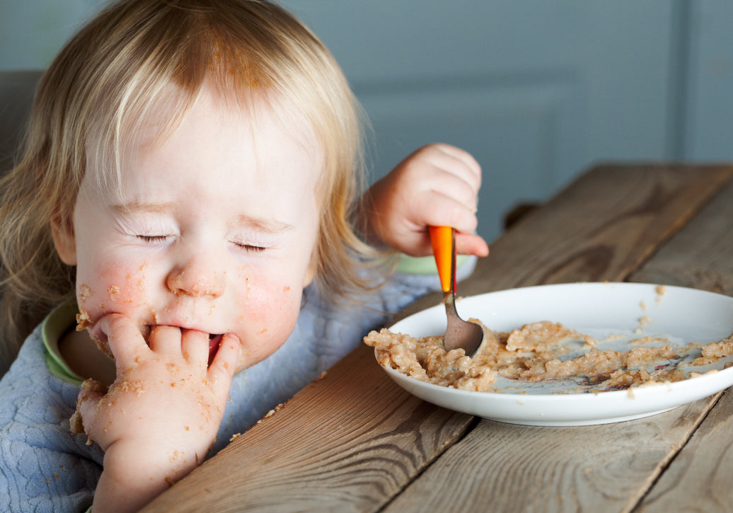 Child with eczema eating