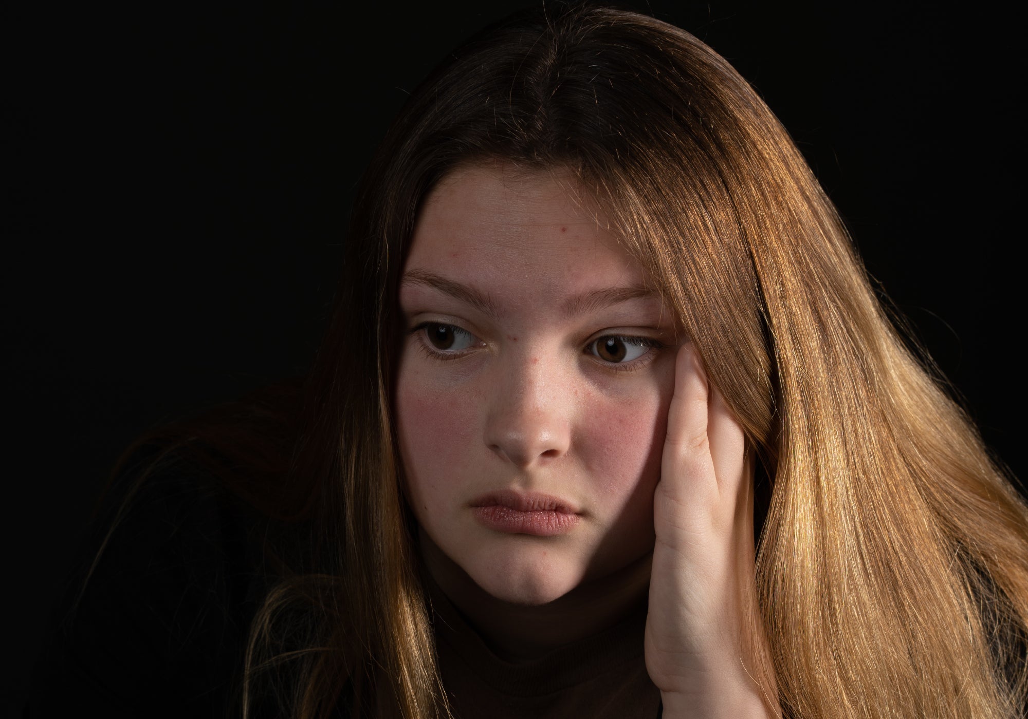 young person waiting