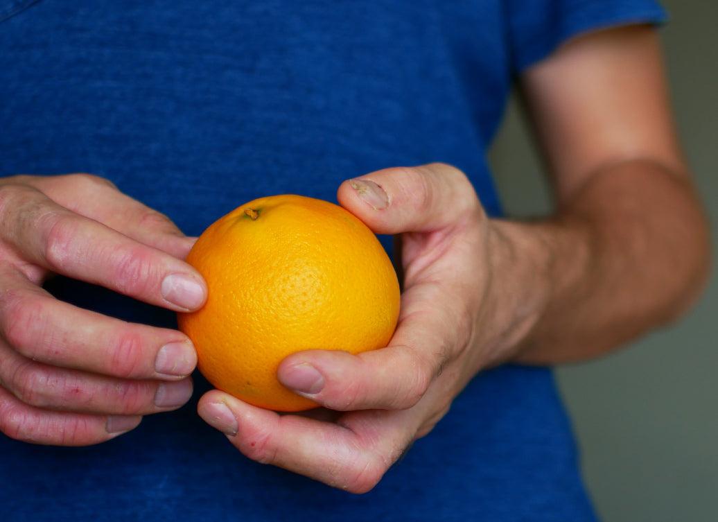 peeling an orange